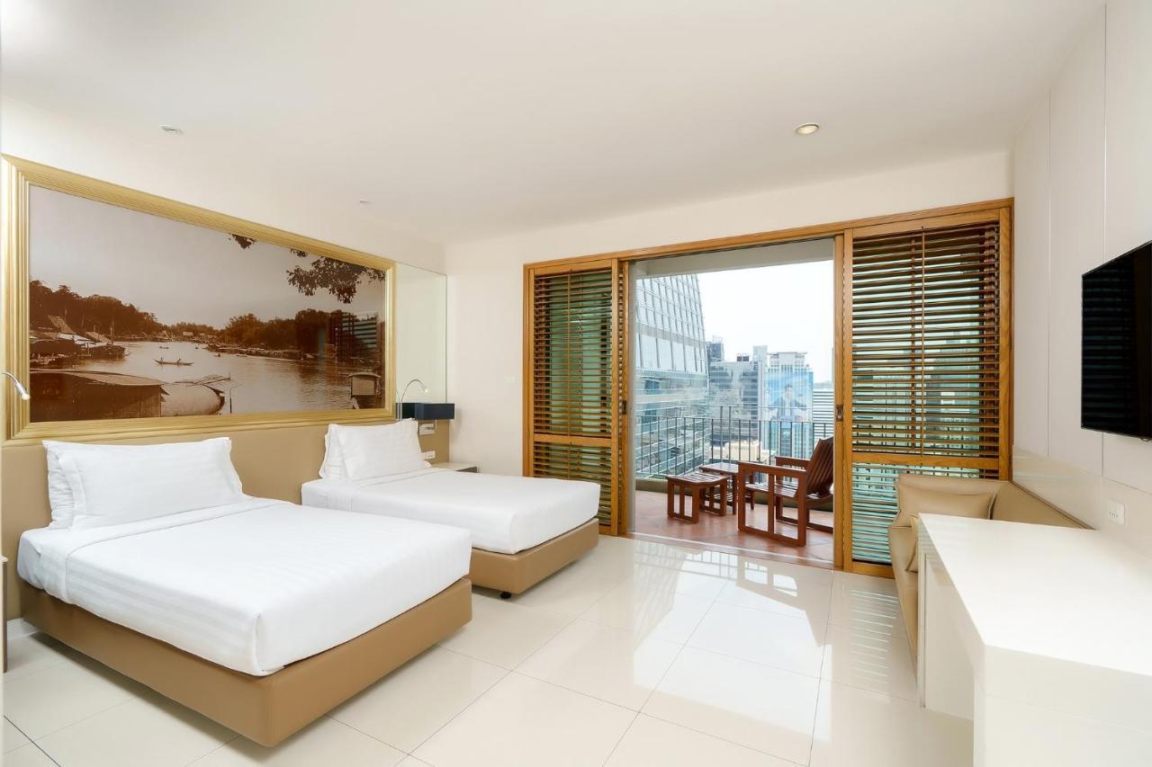 Grande Centre Point Ploenchit Hotel Bangkok Exterior photo Deluxe Room