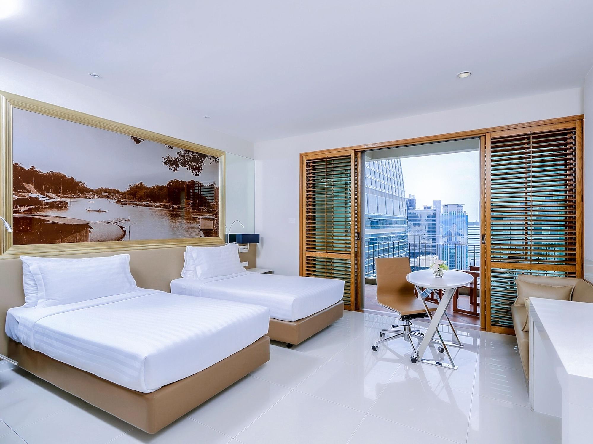 Grande Centre Point Ploenchit Hotel Bangkok Exterior photo Deluxe Room